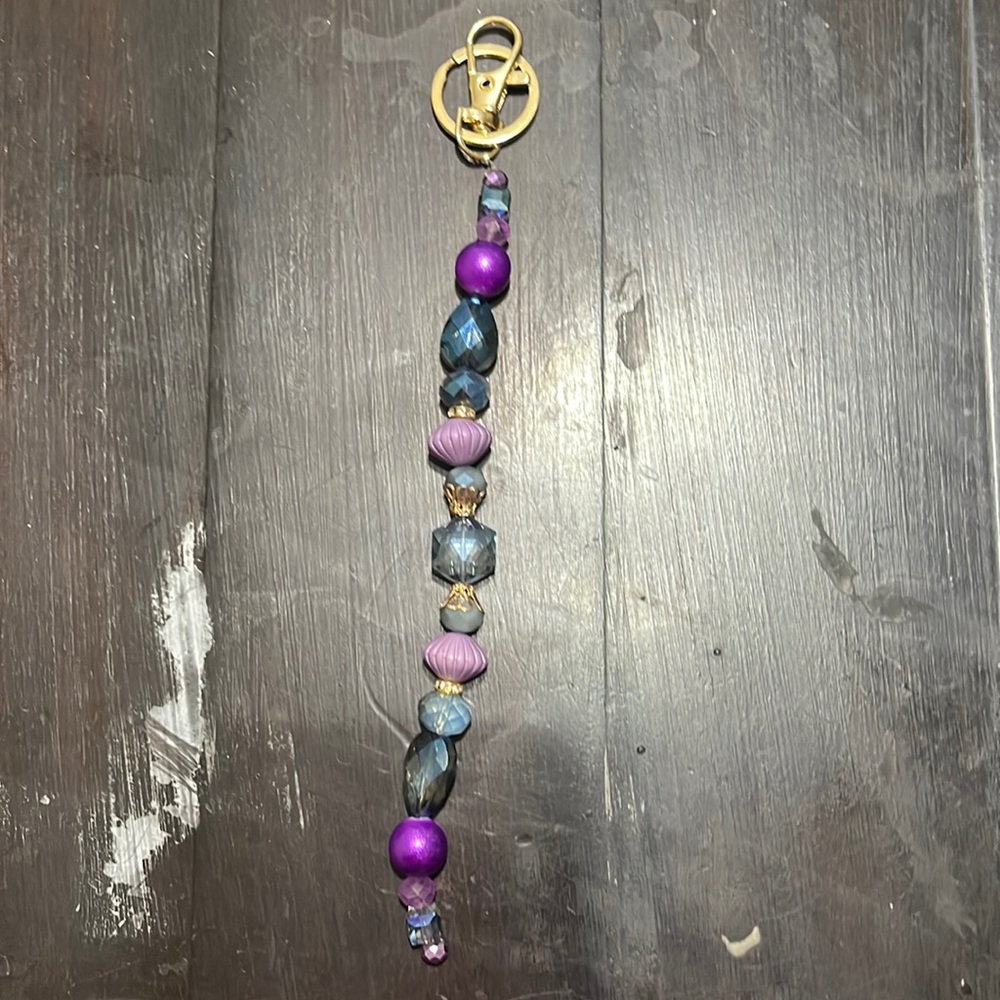 Bead key ring and hook chain.